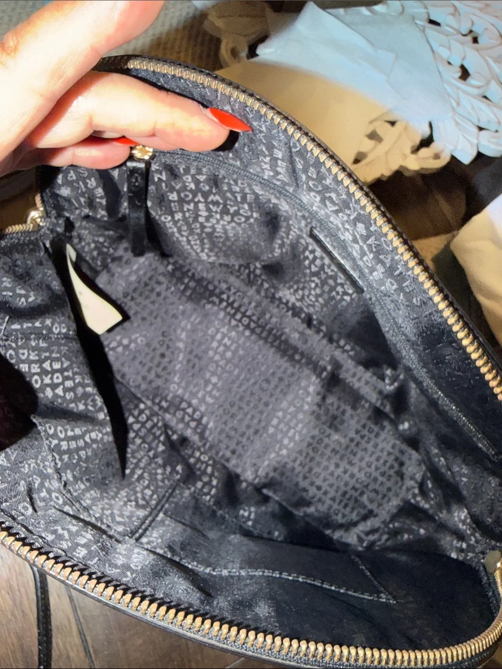 Kate Spade Grove Street Carli Satchel features a classic look
